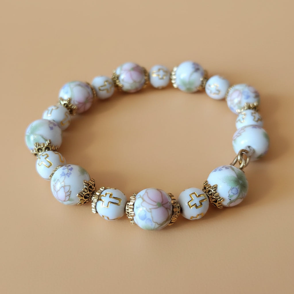 Bracelet Fleurs pastel et croix gravée